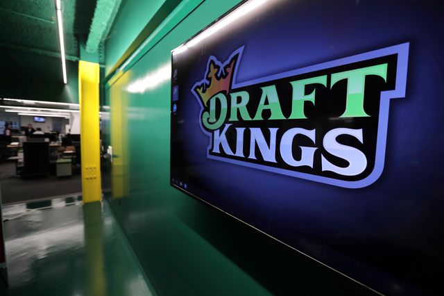 The DraftKings logo is displayed at the sports betting company headquarters in Boston.